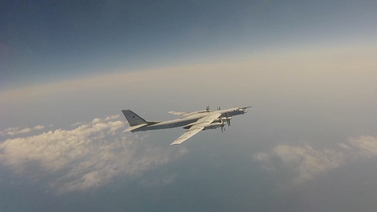 Russian Tu-95 strategic bomber flies during China joint military exercise
