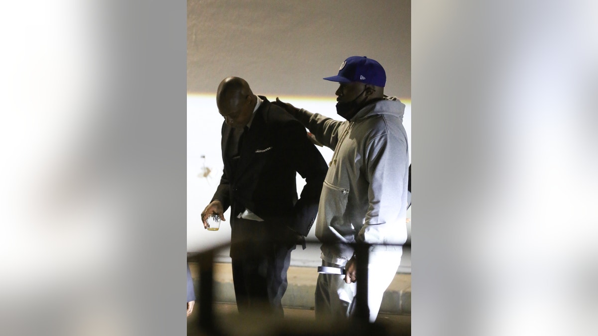 Dave Chappelle looks visibly upset as he is seen leaving his performance at the Hollywood Bowl after being attacked on stage.