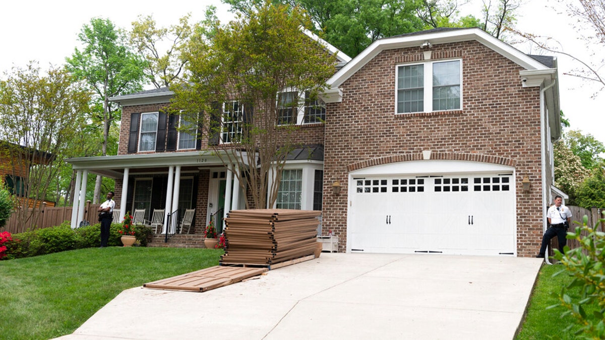 U.S. Supreme Court police stand outside the home of Justice Samuel Alito on Thursday, May 5, 2022, in Alexandria, Va.