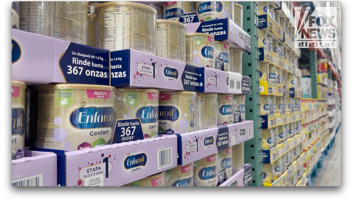 Rows of baby formula on a store shelf