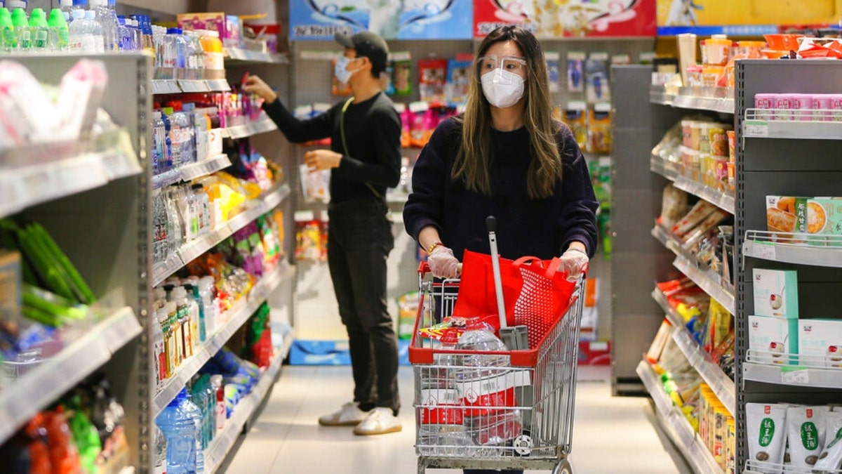 Residents shop at a Shanghai supermarket