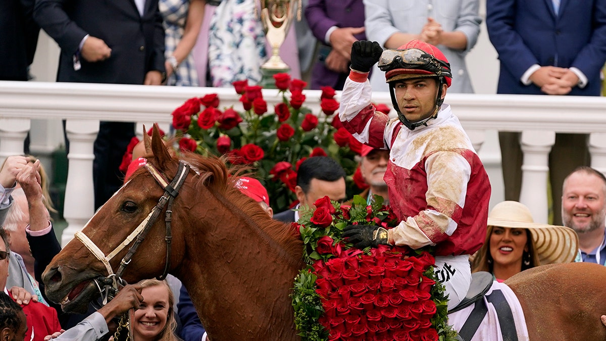 Jockey Sonny Leon rides Rich Strike in the winner's circle after winning the 148th running of the Kentucky Derby horse race at Churchill Downs Saturday, May 7, 2022, in Louisville, Ky. 