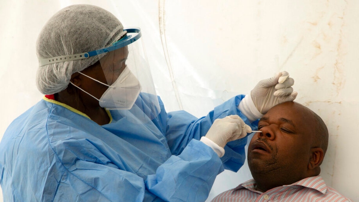 A man undergoes a COVID-19 test in South Africa