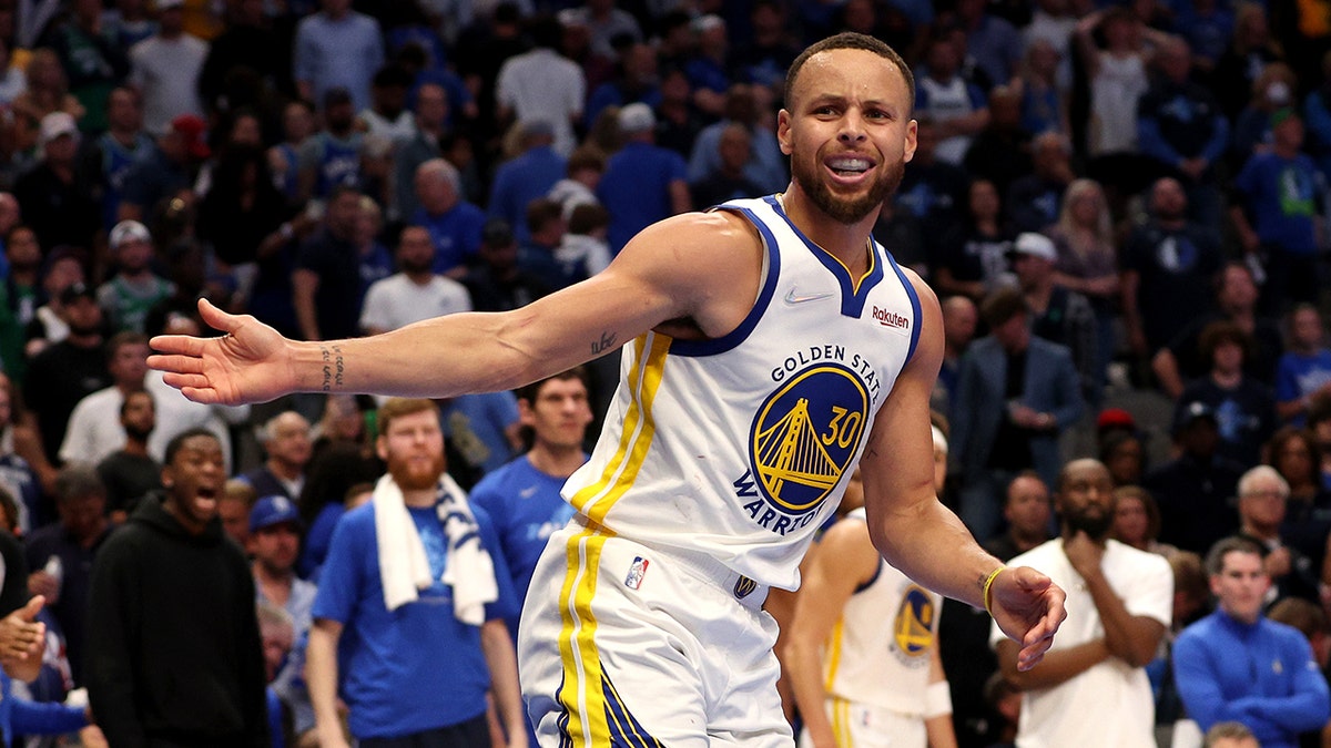 Warriors' Steph Curry reacts to Luka Doncic