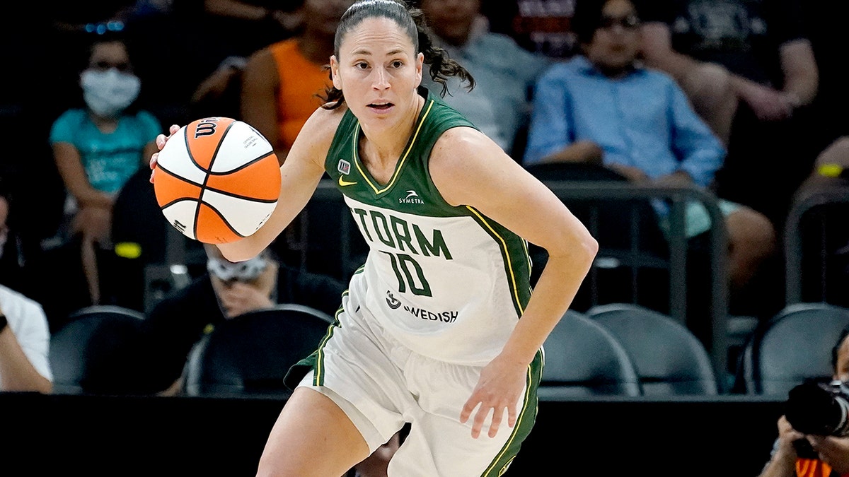 FILE - Seattle Storm guard Sue Bird (10) brings the ball upcourt during the first half of the Commissioner's Cup WNBA basketball game against the Connecticut Sun on Aug. 12, 2021, in Phoenix.