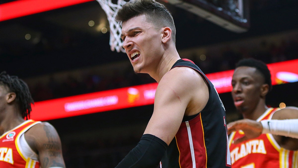 Miami Heat guard Tyler Herro celebrates after a basket during the second half of Game 3 of the team's NBA basketball first-round playoff series against the Atlanta Hawks, Friday, April 22, 2022, in Atlanta. 