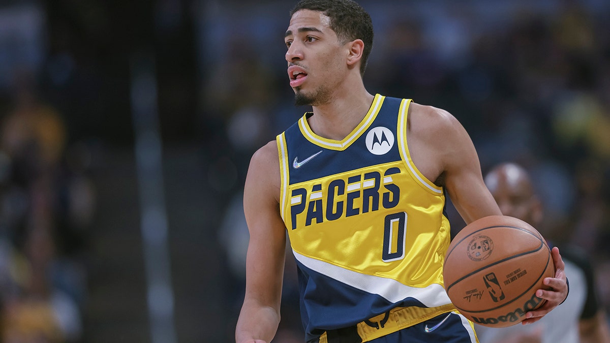 Tyrese Haliburton #0 of the Indiana Pacers brings the ball up court during the game against the Detroit Pistons at Gainbridge Fieldhouse on April 3, 2022 in Indianapolis, Indiana.