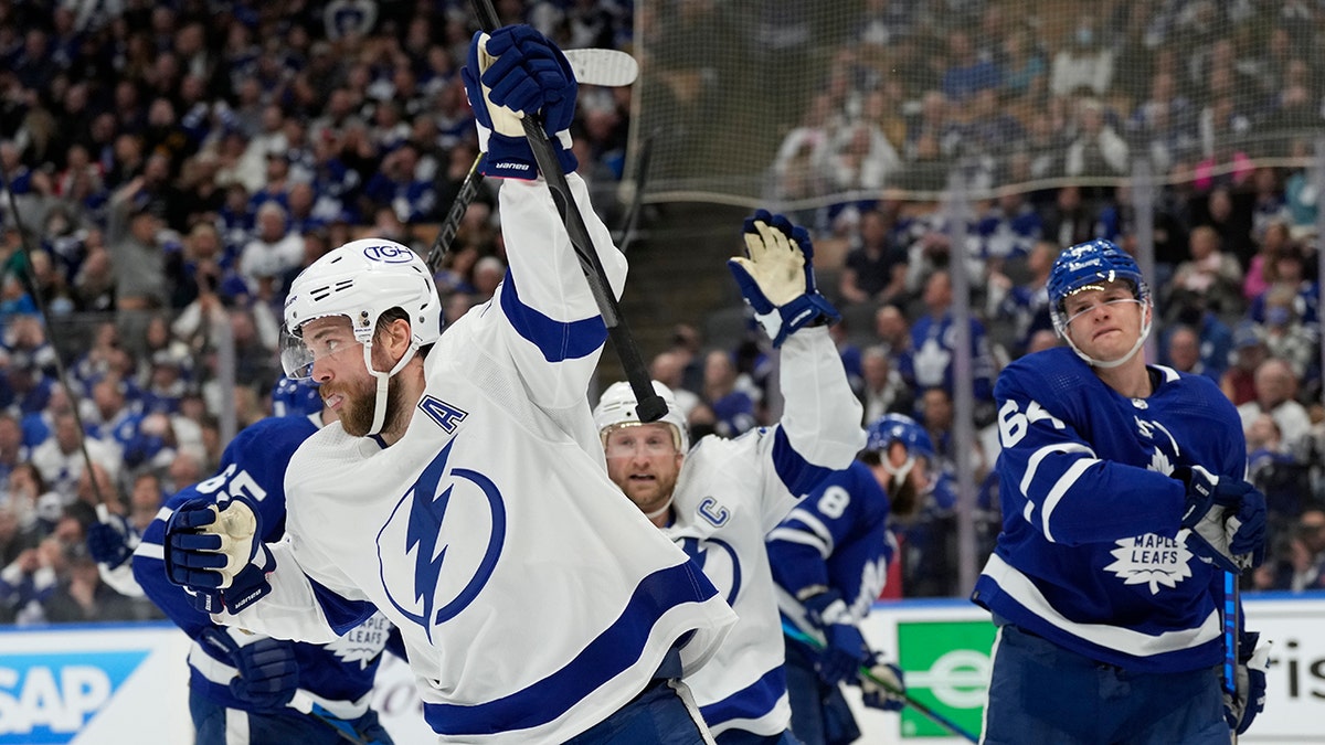 Tampa Bay Lightning defenseman Victor Hedman (77) celebrates his goal against the Toronto Maple Leafs with center Steven Stamkos (91) during the first period of Game 2 of an NHL hockey Stanley Cup playoffs first-round series Wednesday, May 4, 2022, in Toronto. 