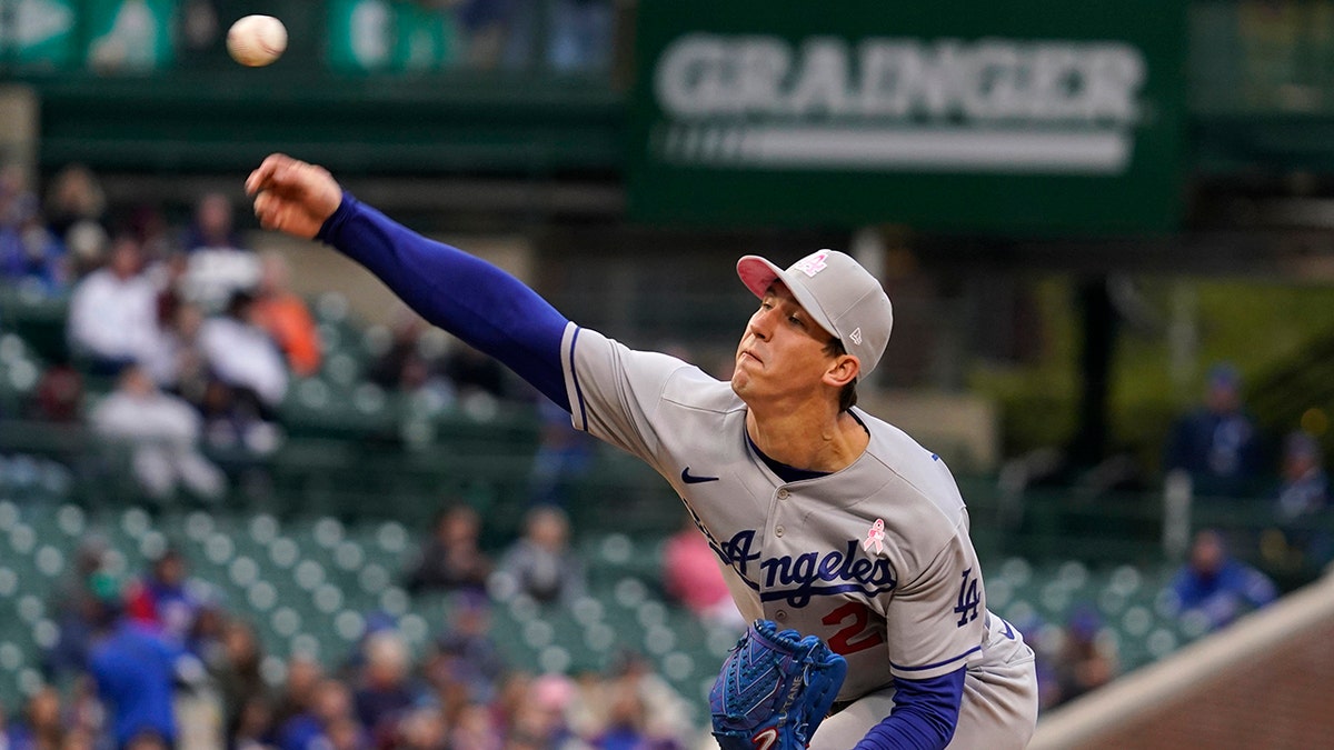 Los Angeles Dodgers starting pitcher Walker Buehler throws against the Chicago Cubs during the first inning of a baseball game in Chicago, Sunday, May 8, 2022. 