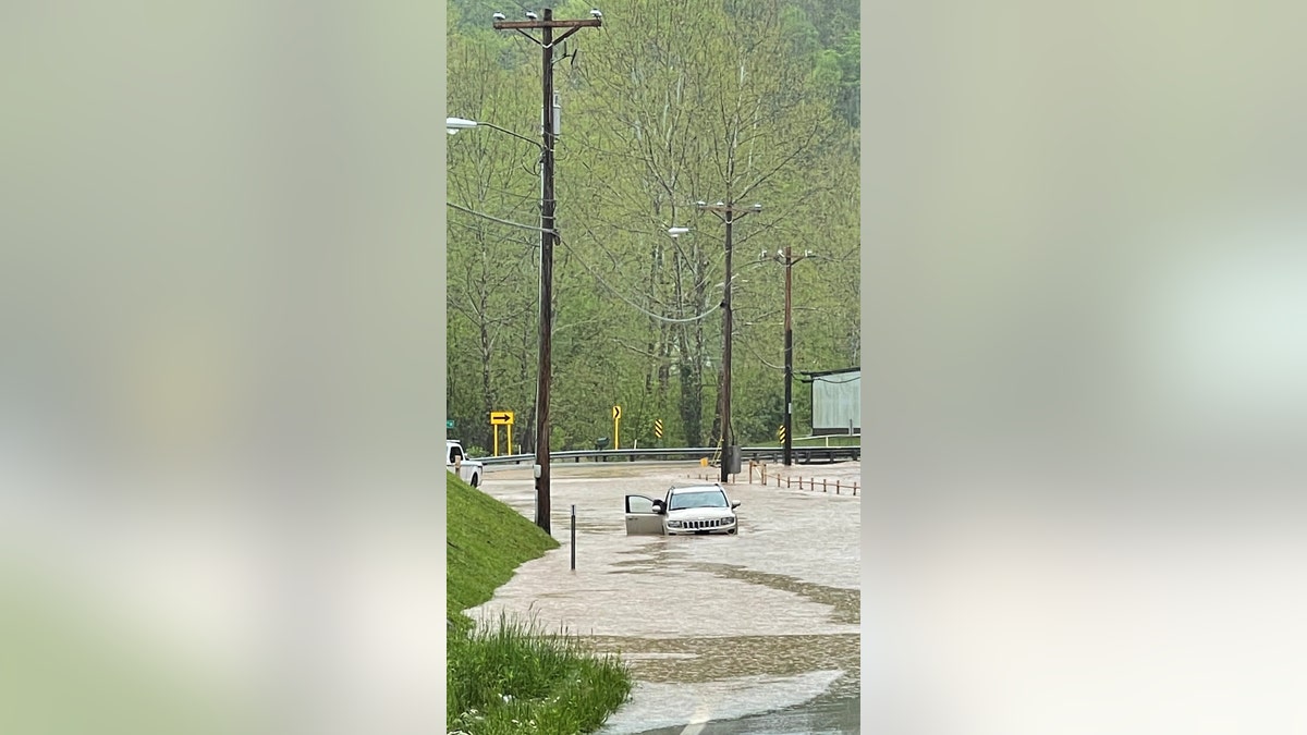 Vehicle underwater as floods run through West Virginia