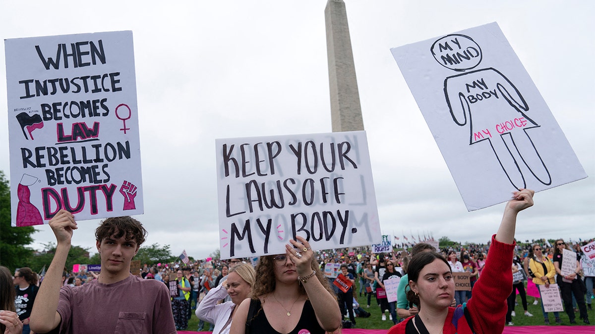 Abortion rights activist rally at the Washington Monument before a march to the U.S. Supreme Court in Washington, May 14, 2022. (Photo by JOSE LUIS MAGANA/AFP via Getty Images)