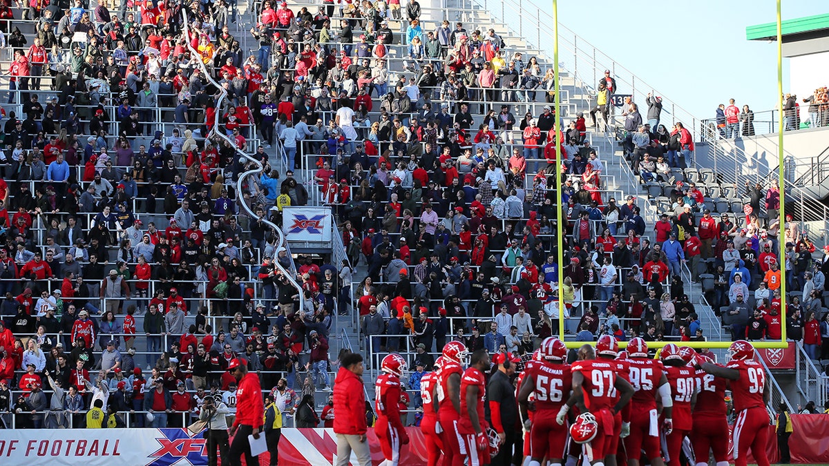 Fans create a 'beer snake' during the XFL game between the St. Louis BattleHawks and the DC Defenders at Audi Field on March 8, 2020 in Washington, DC.