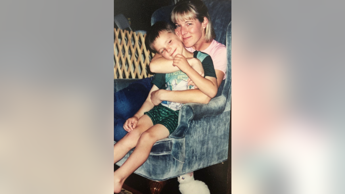 Zak and Kathy Poirer pose together in an old family photo