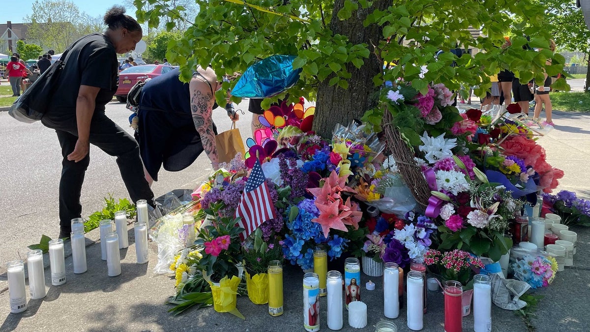 Memorials outside of the Tops supermarket