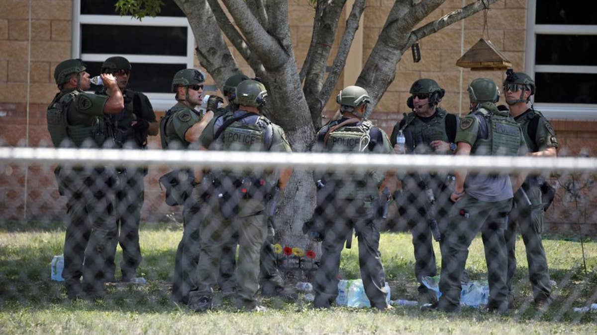 Police outside Robb Elementary school in Uvalde, Texas