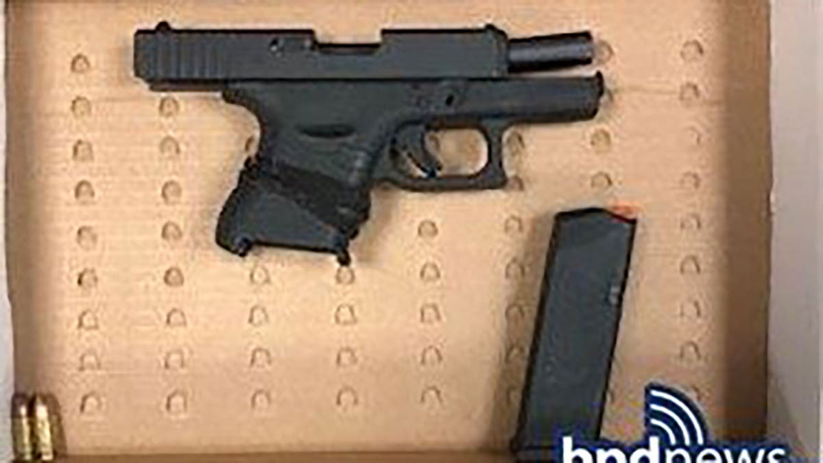 Boston police photo of gun recovered from juveniles