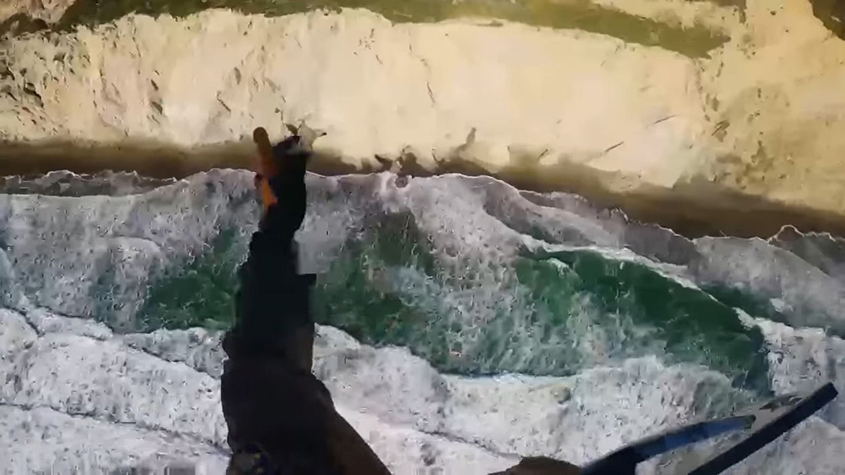 Cliff rescue on Mussel Rock near Daly City, California