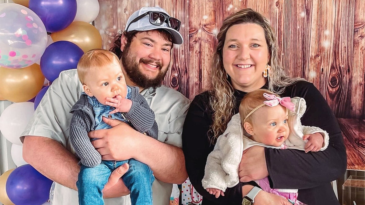 Cierra Vos and her husband Dalton Vos hold their twins