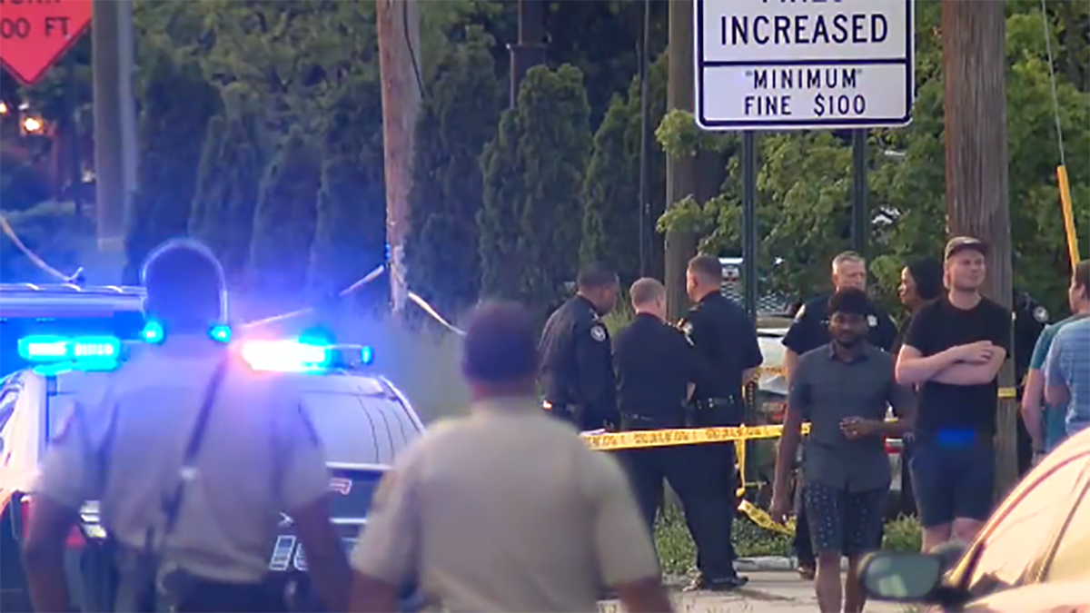 Atlanta officers and police lights scene outside steakhouse shooting 