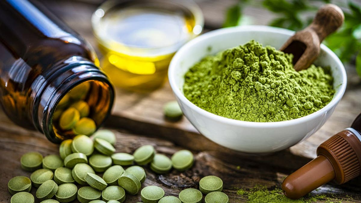 Moringa supplements, powder and tea on display
