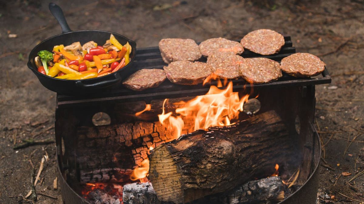 hamburgers on barbecue outside