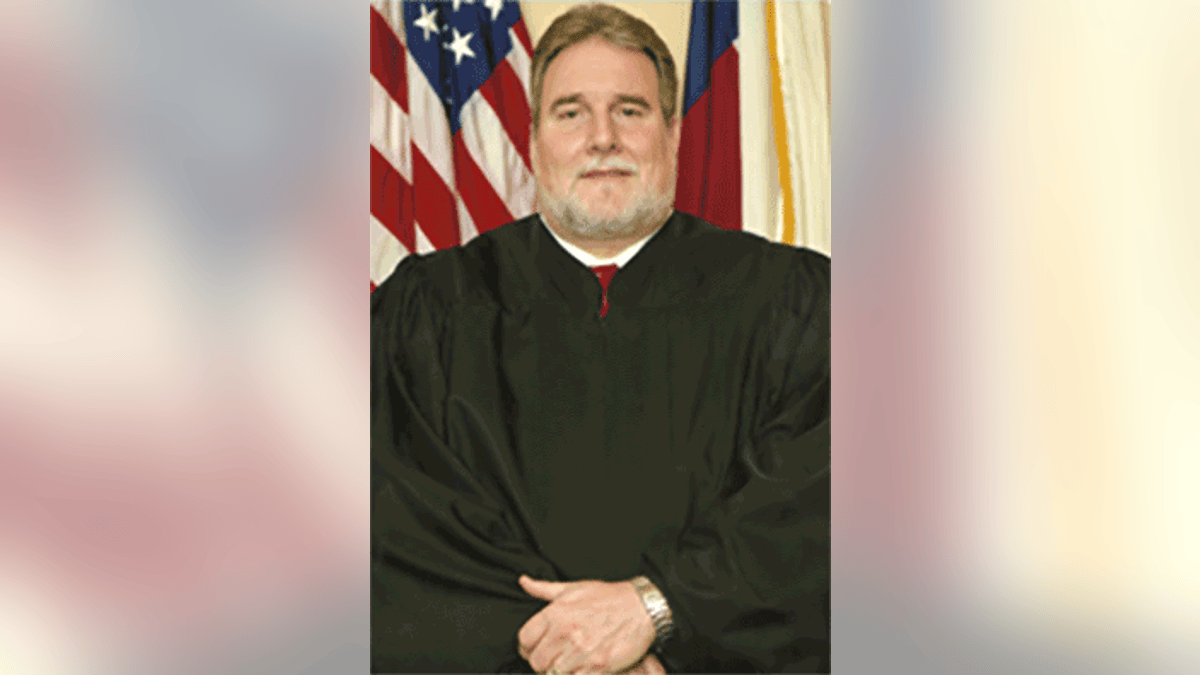 John Lipscombe was elected as judge in Travis County in 2011.