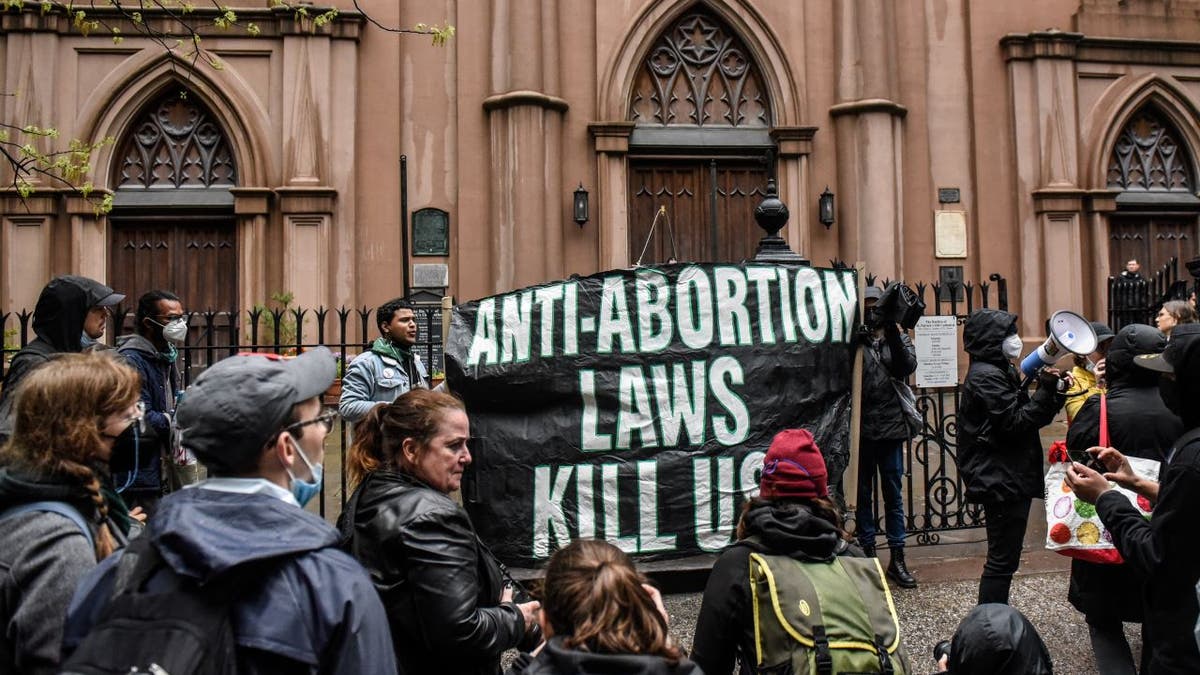 Abortion-rights activists gather outside of a Catholic church in downtown Manhattan to voice their support for a woman's right to choose on May 07, 2022 in New York City.?