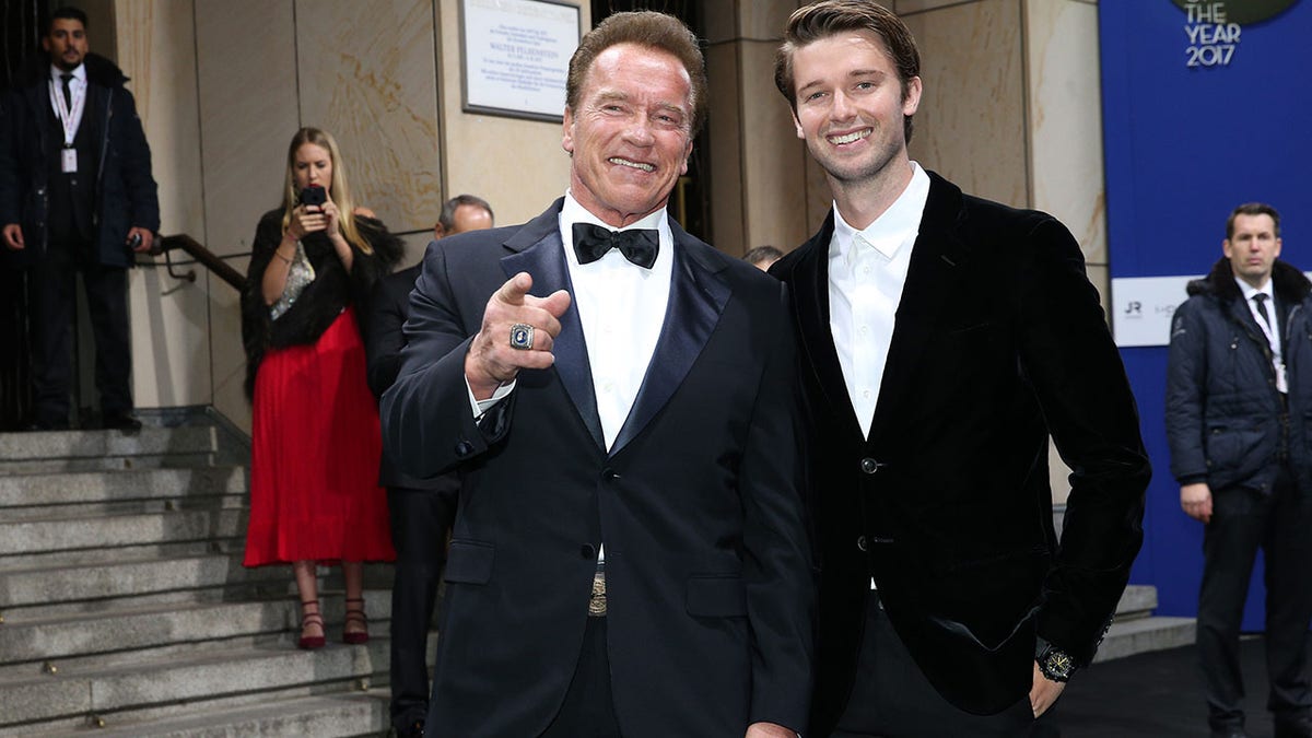 Arnold Schwarzenegger and his son Patrick Schwarzenegger are seen in 2017.