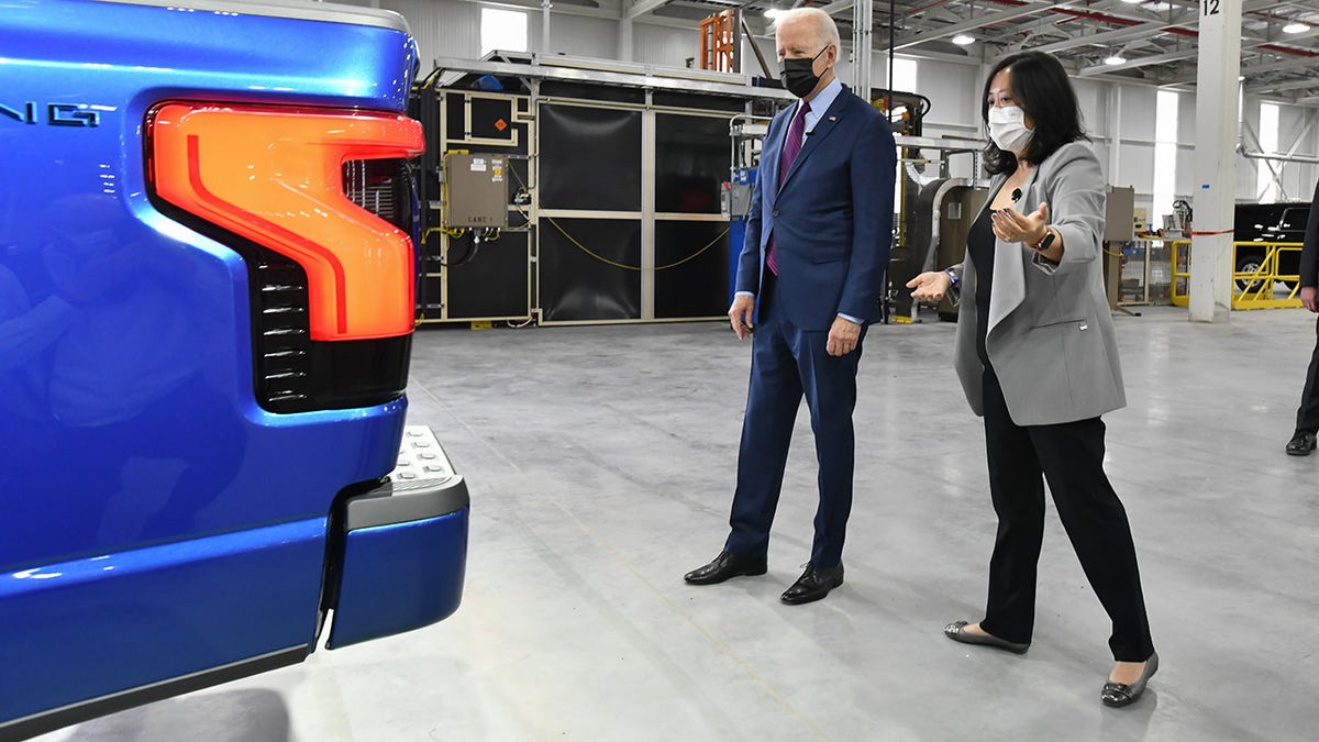 President Biden looks at electric vehicle