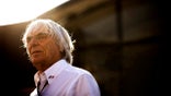 British Chief Executive Of The Formula One Group Bernie Ecclestone wearing a logo adorned white shirt while standing in the Formula One paddock at the 2013 German Grand Prix, Nurburgring, Germany, on the 6th July 2013.