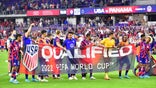 ORLANDO, FLORIDA - MARCH 27: The United States Mens National Team hold a 2022 FIFA World Cup Qualified banner after defeating Panama 5-1 at Exploria Stadium on March 27, 2022 in Orlando, Florida. (Photo by Julio Aguilar/Getty Images)