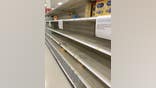 Signs at a local Target inform shoppers that they are limited to 4 containers each due to the shortage in baby formula.