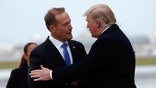 U.S. President Donald Trump greets Ted Budd, Republican candidate from North Carolina's 13th district, in Charlotte, North Carolina, U.S., October 26, 2018.  REUTERS/Kevin Lamarque