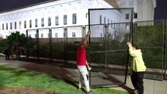 Massive fence erected around Supreme Court building and justice cancels public event amid protests