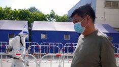 Beijing preps COVID-19 hospital facilities, orders more testing