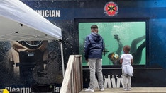 US Navy displays Times Square dive tank during Fleet Week