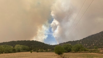 Cooler weather temporarily aids effort to fight fire in New Mexico