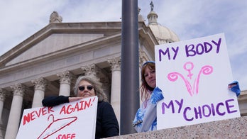 Oklahoma governor signs Texas-style abortion ban into law