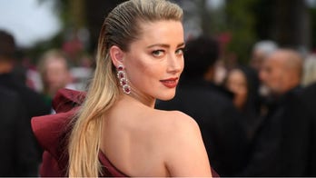Amber Heard is both "mom and dad" to baby girl Oonagh Paige