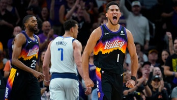 Deandre Ayton, Devin Booker lead top-seeded Suns past Mavericks
