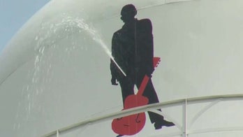 Johnny Cash mural springs a curious leak after vandal shoots hometown water tower in 'sensitive area'
