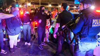LA abortion protest turns violent: Protesters lob 'rocks and bottles' at cops, smash cruiser's window