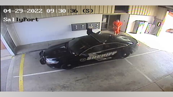 Alabama sheriff releases jailhouse surveillance video showing murder suspect leave with corrections officer