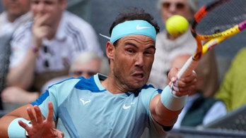 Rafael Nadal returns from injury with straight-set win in Madrid