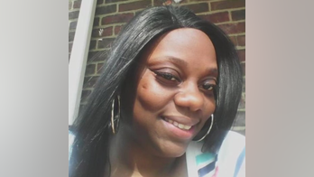 Detroit woman shot at her own kitchen table by drive-by shooter dies in sister's arms