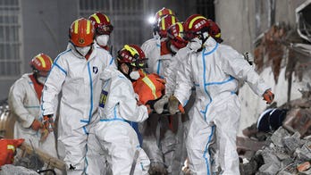 China building collapse survivor found almost 6 days later