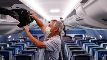 EU lifts mask requirement for air travel as pandemic ebbs