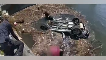 New Jersey police rescue woman from SUV submerged in Delaware River