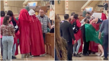 'Handmaid's Tale' protesters barge into Los Angeles cathedral during Mass