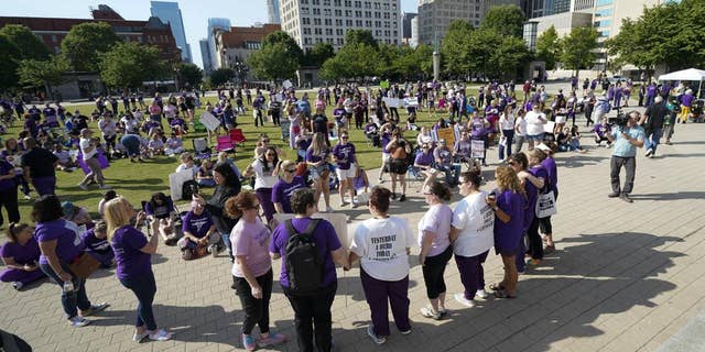 People demonstrate outside the courthouse where former nurse RaDonda Vaught's sentencing hearing is being held Friday, May 13, 2022 in Nashville, Tennessee.